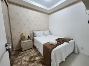 Ένα ή περισσότερα κρεβάτια σε δωμάτιο στο AP ALECRIM Luxo Cond Aquarius I Angra dos Reis +50 φωτογραφίες