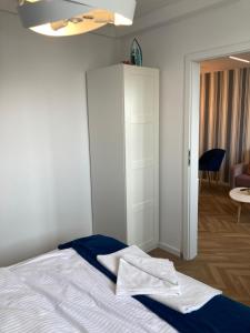 Łóżko lub łóżka w pokoju w obiekcie Tabago Studio 6