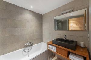 Ένα μπάνιο στο OASIS - Apt 08 - BO Immobilier - remises sur les forfaits de skis Châtel ou Portes du soleil