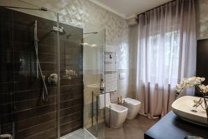 Koupelna v ubytování Verona Suites and Rooms