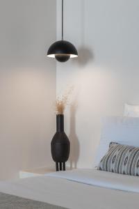 Uma cama ou camas num quarto em Akra Suites & Spa