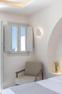 Uma cama ou camas num quarto em Akra Suites & Spa