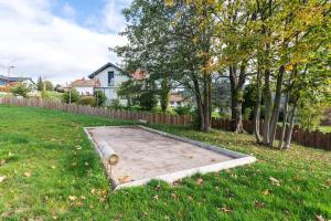 Vonkajšia záhrada v ubytovaní Chalet La Trinité-Spa,Sauna,Pétanque-Gérardmer