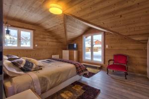 Posteľ alebo postele v izbe v ubytovaní Chalet La Trinité-Spa,Sauna,Pétanque-Gérardmer