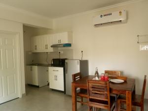 Kuchyň nebo kuchyňský kout v ubytování Serenova by Dia Hotels