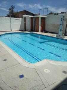 Bazén v ubytování Casa con piscina para descanso nebo v jeho okolí