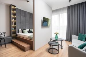 Postel nebo postele na pokoji v ubytování Ukiel Park 26 by RENT4YOU