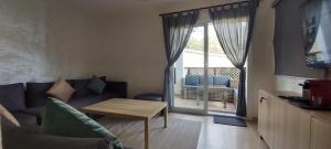 Posezení v ubytování Complexe Bella Vista Cabo Negro Martil Mdiq avec Piscines Plage WIFI