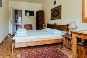 Postel nebo postele na pokoji v ubytování IRIS B&B in DEBED CANYON