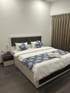 Postel nebo postele na pokoji v ubytování Seandee - Lush Private Rooms in Viman Nagar