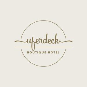 a logo for a boutique hotel at Uferdeck - Boutique Hotel in Traben-Trarbach