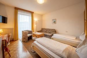 Postel nebo postele na pokoji v ubytování Garni-Residence Villa Paul