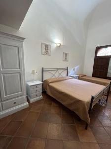Posteľ alebo postele v izbe v ubytovaní B&B Cinisi Vacanze