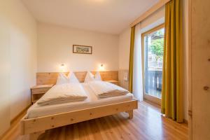 Postel nebo postele na pokoji v ubytování Garni-Residence Villa Paul