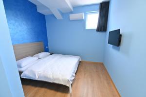 Voodi või voodid majutusasutuse Easy Apartments Kumanovo toas