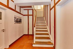 a staircase in a home with wooden floors at NEU!!! Moselbleibe Uferallee in Bernkastel-Kues +72 photos