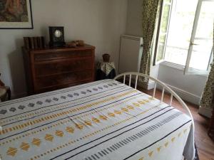 Postel nebo postele na pokoji v ubytování Gîte Sous L' Orme + 3 fotografie