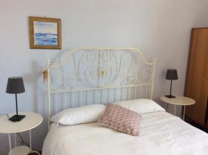 Katil atau katil-katil dalam bilik di Albergo Gargnano