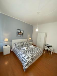 Postel nebo postele na pokoji v ubytování Delle Rose Rooms