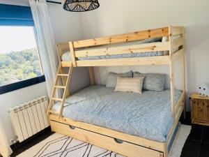 A bed or beds in a room at Mirador del Río