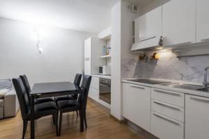 Kuchyňa alebo kuchynka v ubytovaní Cozy & comfy apt in Navigli area