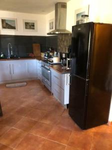 Kuchyňa alebo kuchynka v ubytovaní Villa en corse du sud entre mer et montagne