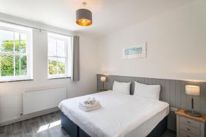 Cama ou camas em um quarto em Tregenna Castle Resort