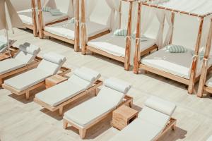 an overhead view of a group of bunk beds at Cavo Bianco Boutique Hotel & Spa in Kamari