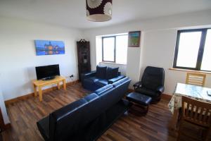 Χώρος καθιστικού στο Seaside Views +4 φωτογραφίες