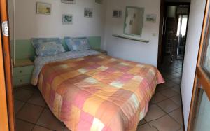 Postel nebo postele na pokoji v ubytování Lampedusa 119
