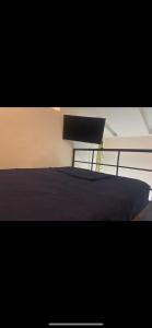 Двухъярусная кровать или двухъярусные кровати в номере Loft La 70 Laurles Estadio