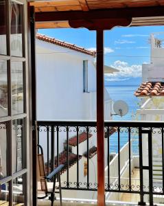 a view of the ocean from a balcony at Zoe's House Skiathos. Centre of Skiathos in Skiathos