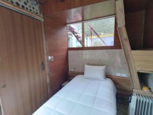 Voodi või voodid majutusasutuse Mamallacta Páramo Lodge toas
