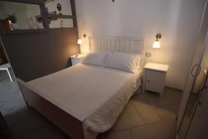 Postel nebo postele na pokoji v ubytování Raggio di Luna