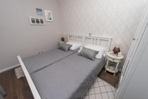 Krevet ili kreveti u jedinici u objektu Sunset Beach Apartment