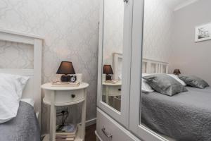 Krevet ili kreveti u jedinici u objektu Sunset Beach Apartment
