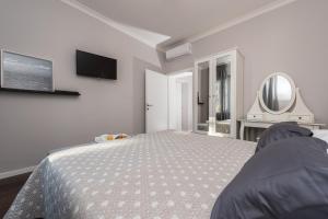 Krevet ili kreveti u jedinici u objektu Sunset Beach Apartment