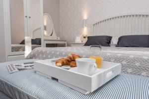 Krevet ili kreveti u jedinici u objektu Sunset Beach Apartment