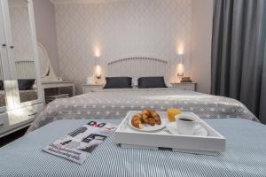 Krevet ili kreveti u jedinici u objektu Sunset Beach Apartment