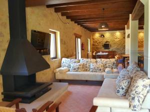 A seating area at Masía restaurada con piscina privada28 pax