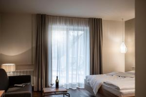 Postel nebo postele na pokoji v ubytování Hotel Weingut Stroblhof