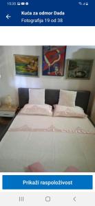 een foto van een slaapkamer met een groot bed bij Apartmani Dada Kanjon Grmuša in Bihać