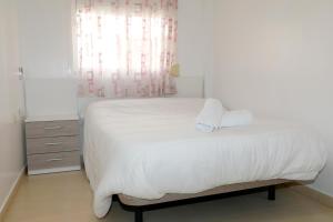Posteľ alebo postele v izbe v ubytovaní Apartamento Completo Clara Campoamor Carboneras