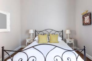 Posteľ alebo postele v izbe v ubytovaní Spagna Art & Suites - CA Domus Collection