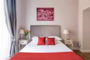 Posteľ alebo postele v izbe v ubytovaní Spagna Art & Suites - CA Domus Collection