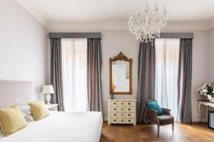 Posteľ alebo postele v izbe v ubytovaní Spagna Art & Suites - CA Domus Collection