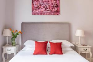 Posteľ alebo postele v izbe v ubytovaní Spagna Art & Suites - CA Domus Collection