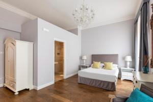 Posteľ alebo postele v izbe v ubytovaní Spagna Art & Suites - CA Domus Collection