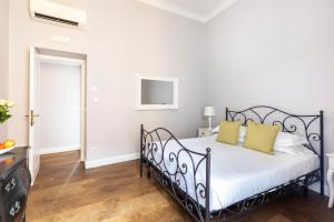 Posteľ alebo postele v izbe v ubytovaní Spagna Art & Suites - CA Domus Collection