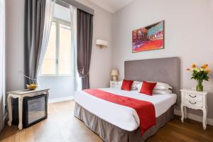 Posteľ alebo postele v izbe v ubytovaní Spagna Art & Suites - CA Domus Collection